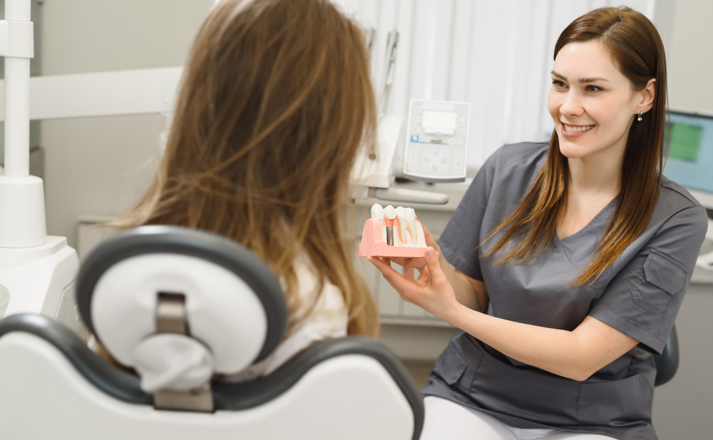 Dentist consulting on dental implants in Decatur, GA